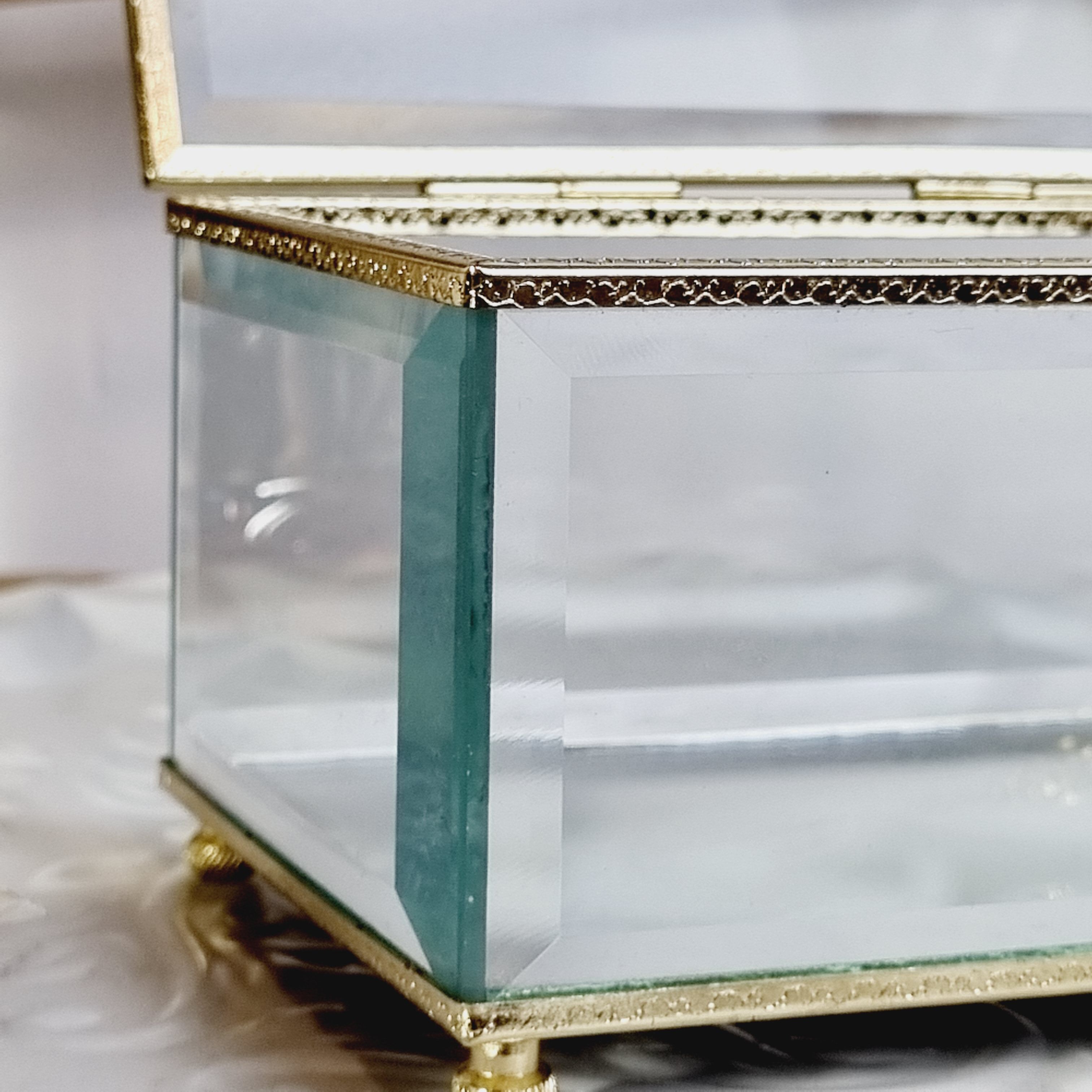 Beveled and chiseled glass and brass jewelry box
