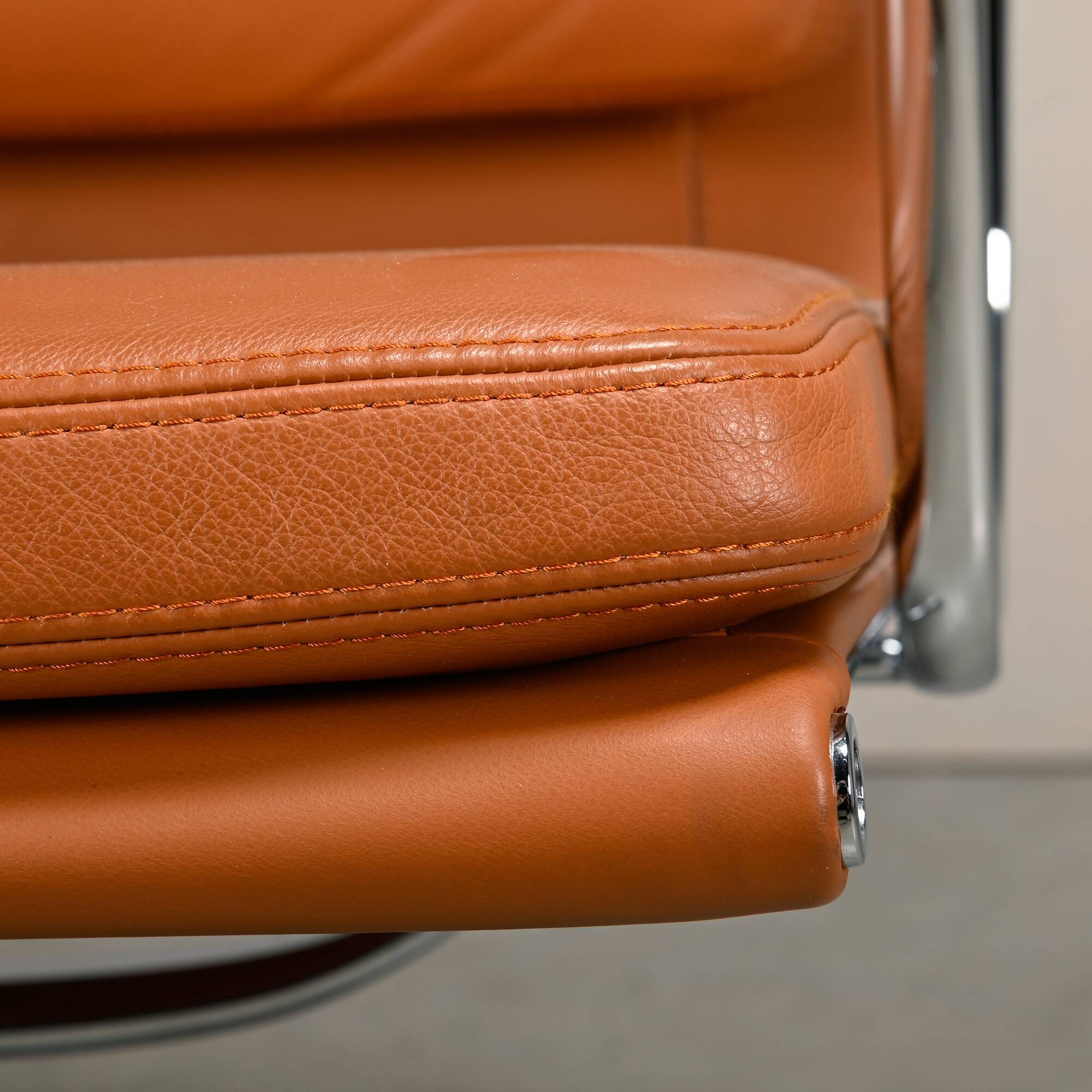 Charles & Ray Eames EA208 Soft Pad Chairs Chrome and Cognac leather, Vitra