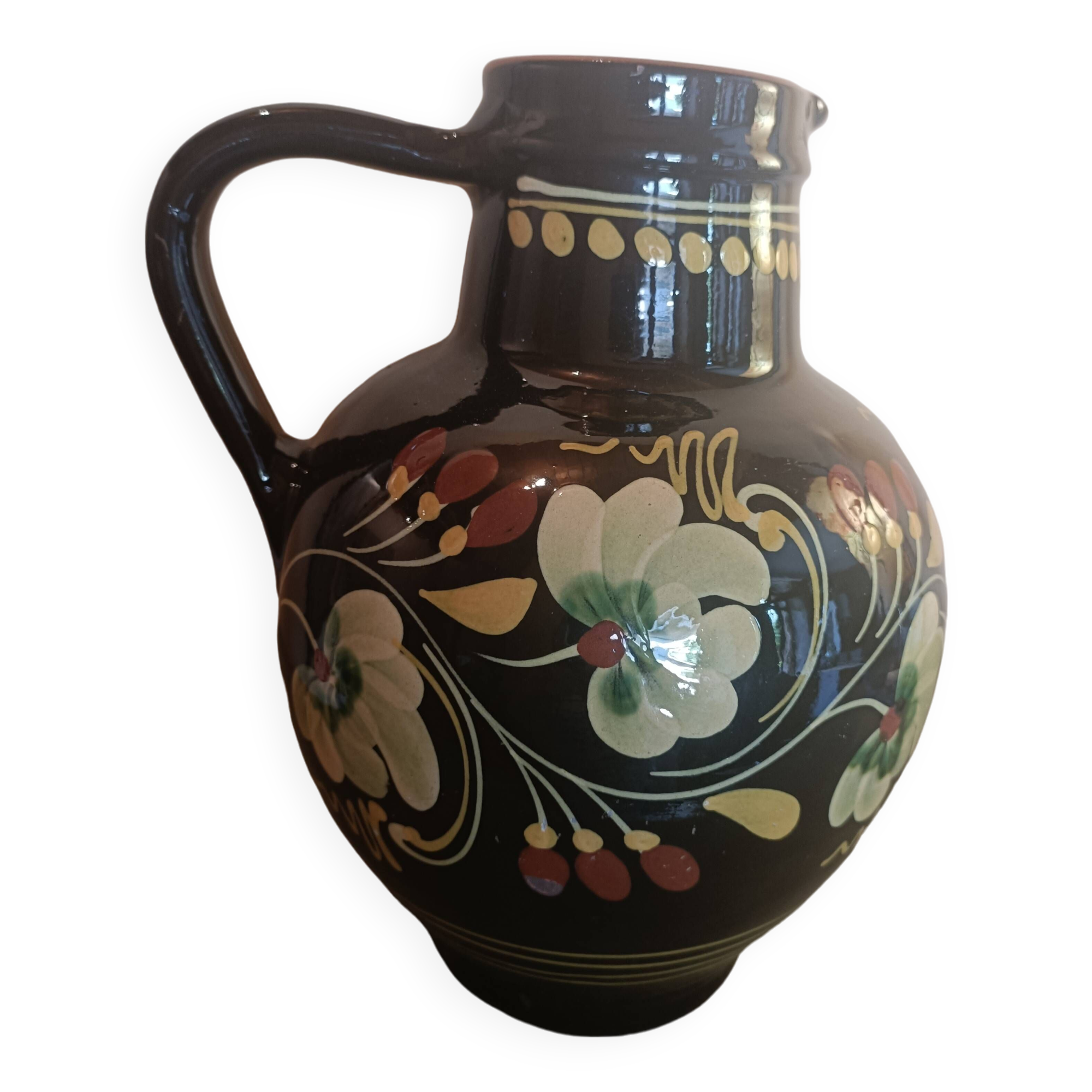 Large glazed terracotta pitcher with floral decoration