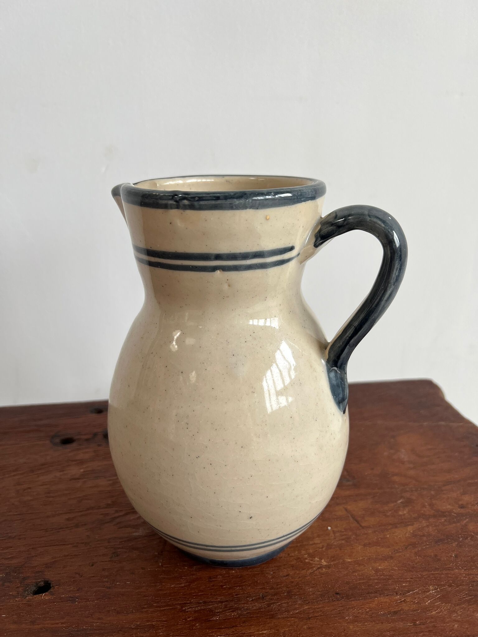 Off-white glossy ceramic decanter, hand-painted gray blue patterns H:20cm