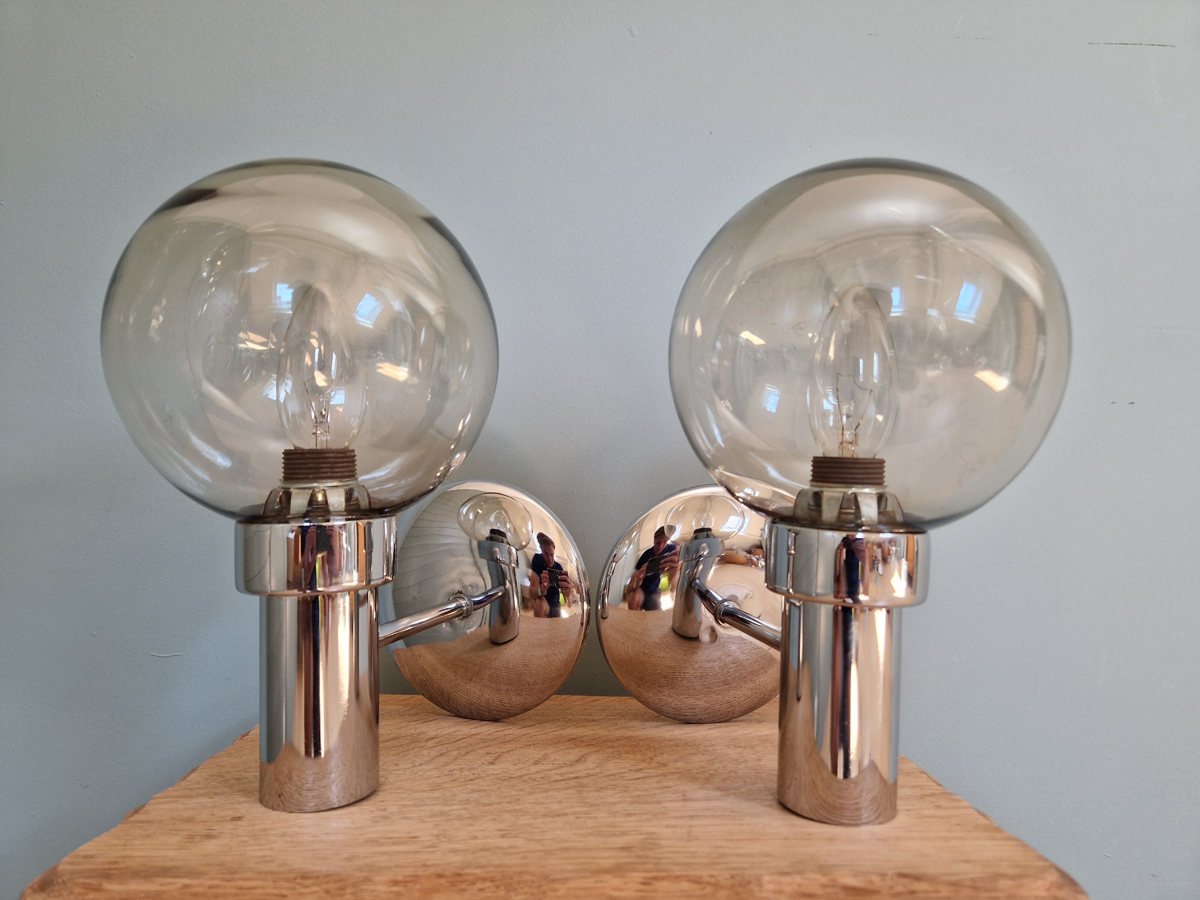 Pair of vintage wall lights in chromed metal and smoked glass, 70s