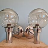 Pair of vintage wall lights in chromed metal and smoked glass, 70s
