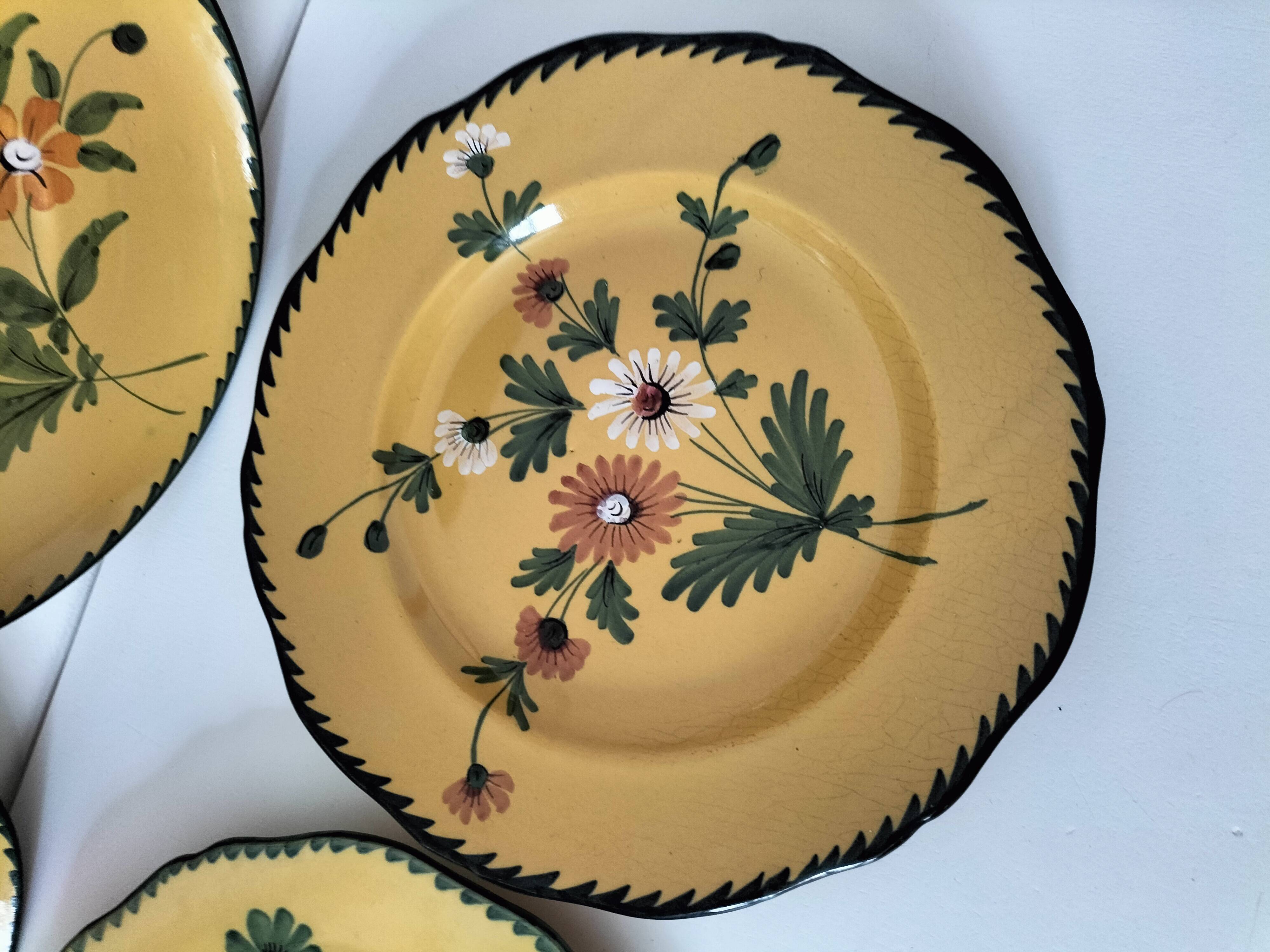 4 antique plates in hand-painted faience