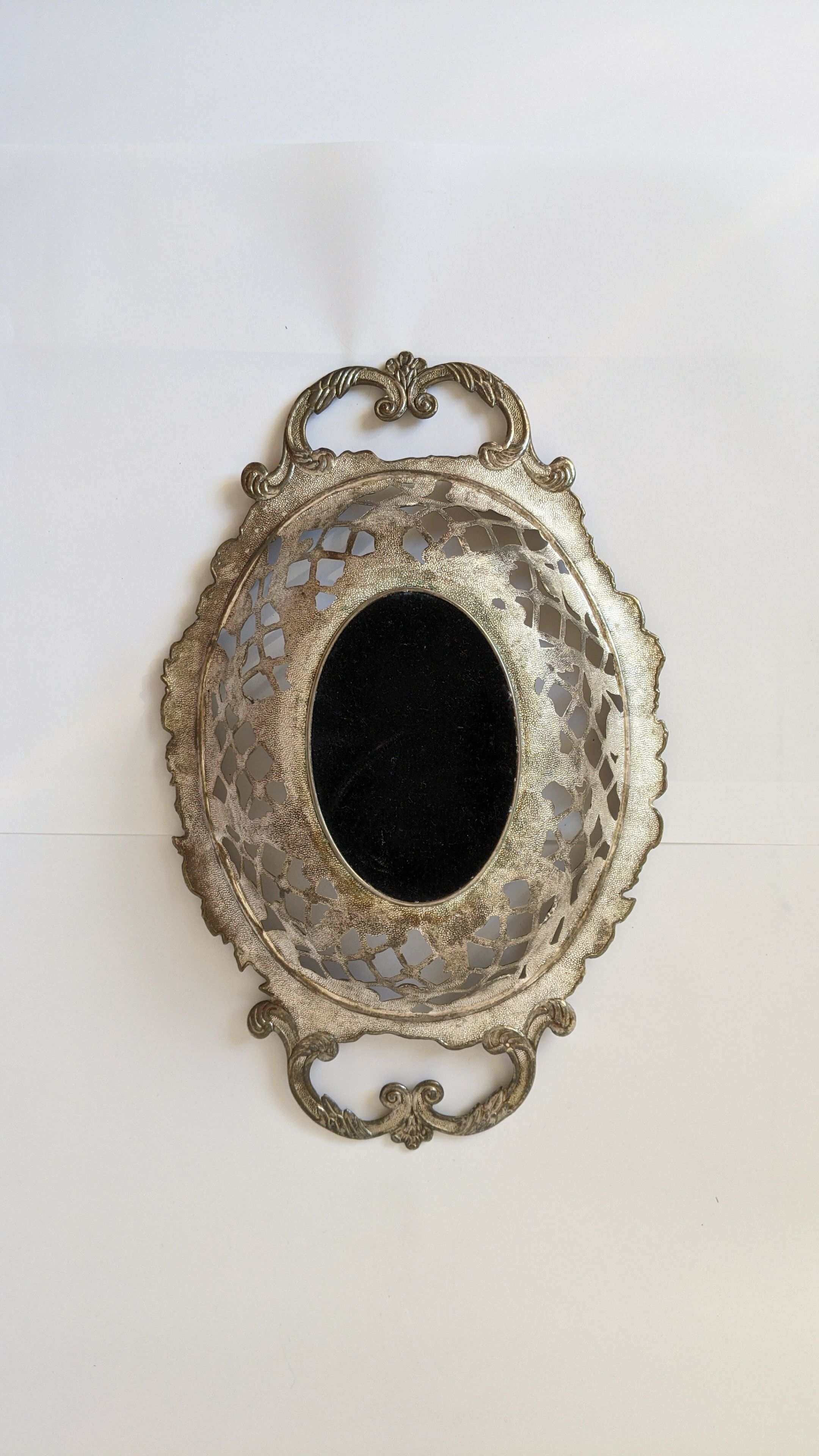 Beautiful silver metal basket with rose decoration