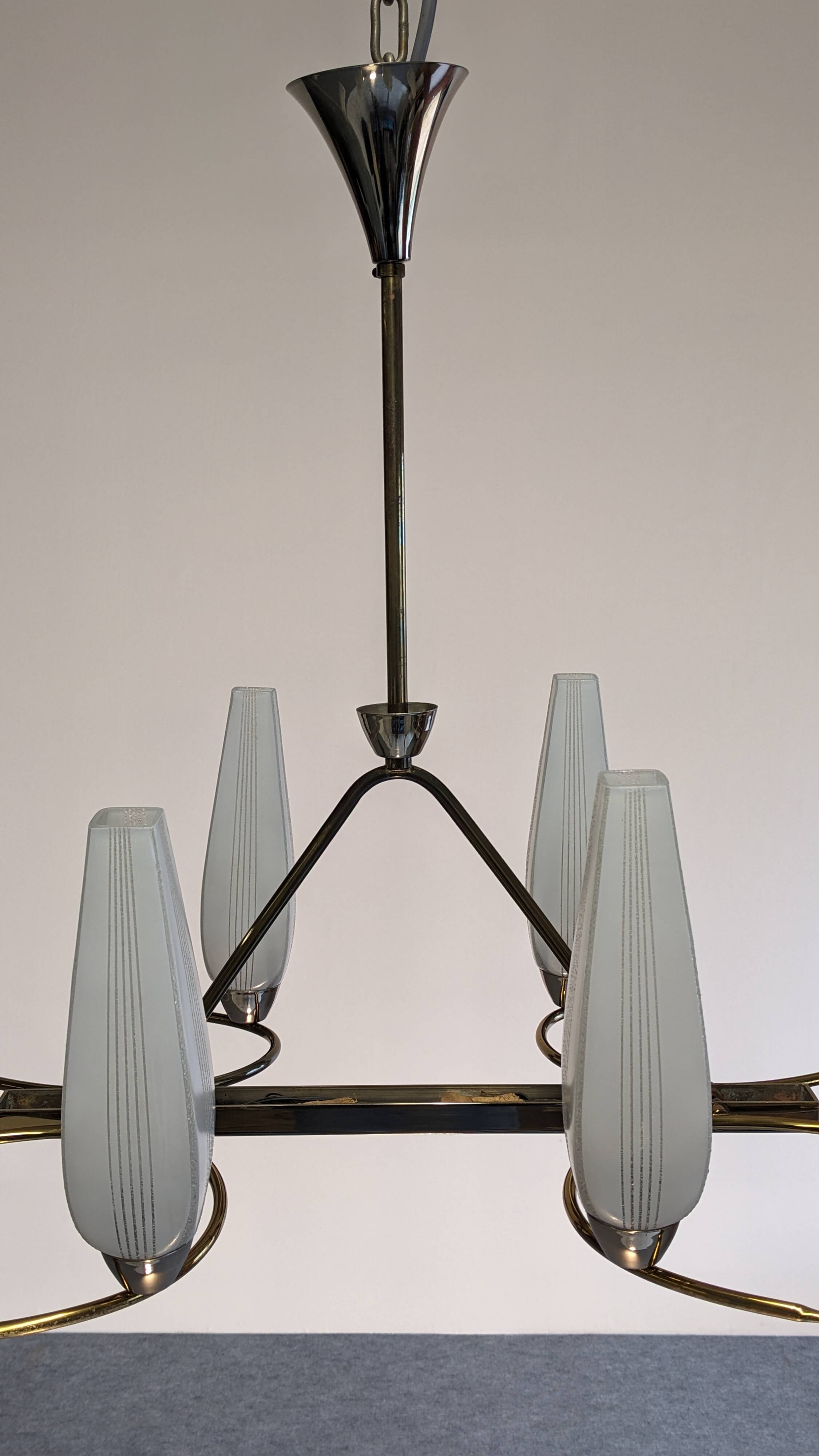 Eight-light chandelier in glass and brass, France circa 1960.