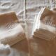 Set of 16 table napkins and an old floral damask tablecloth.