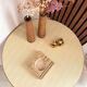 Vintage round tripod side table in rattan