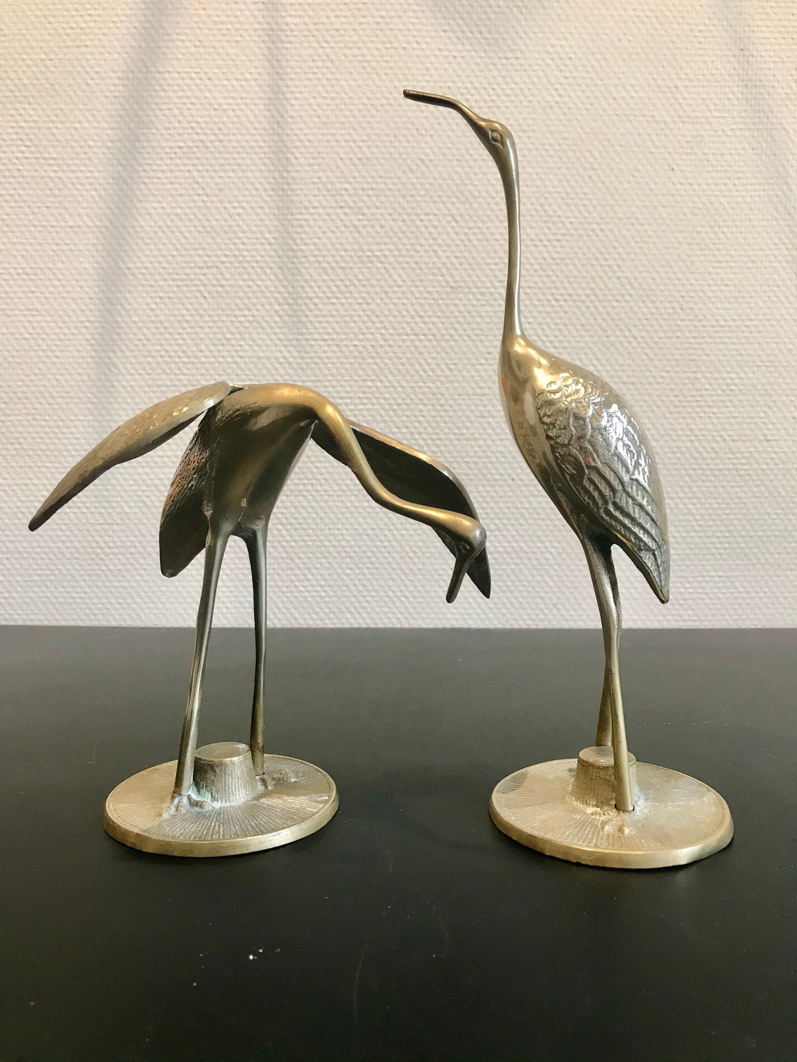 Couple of brass birds