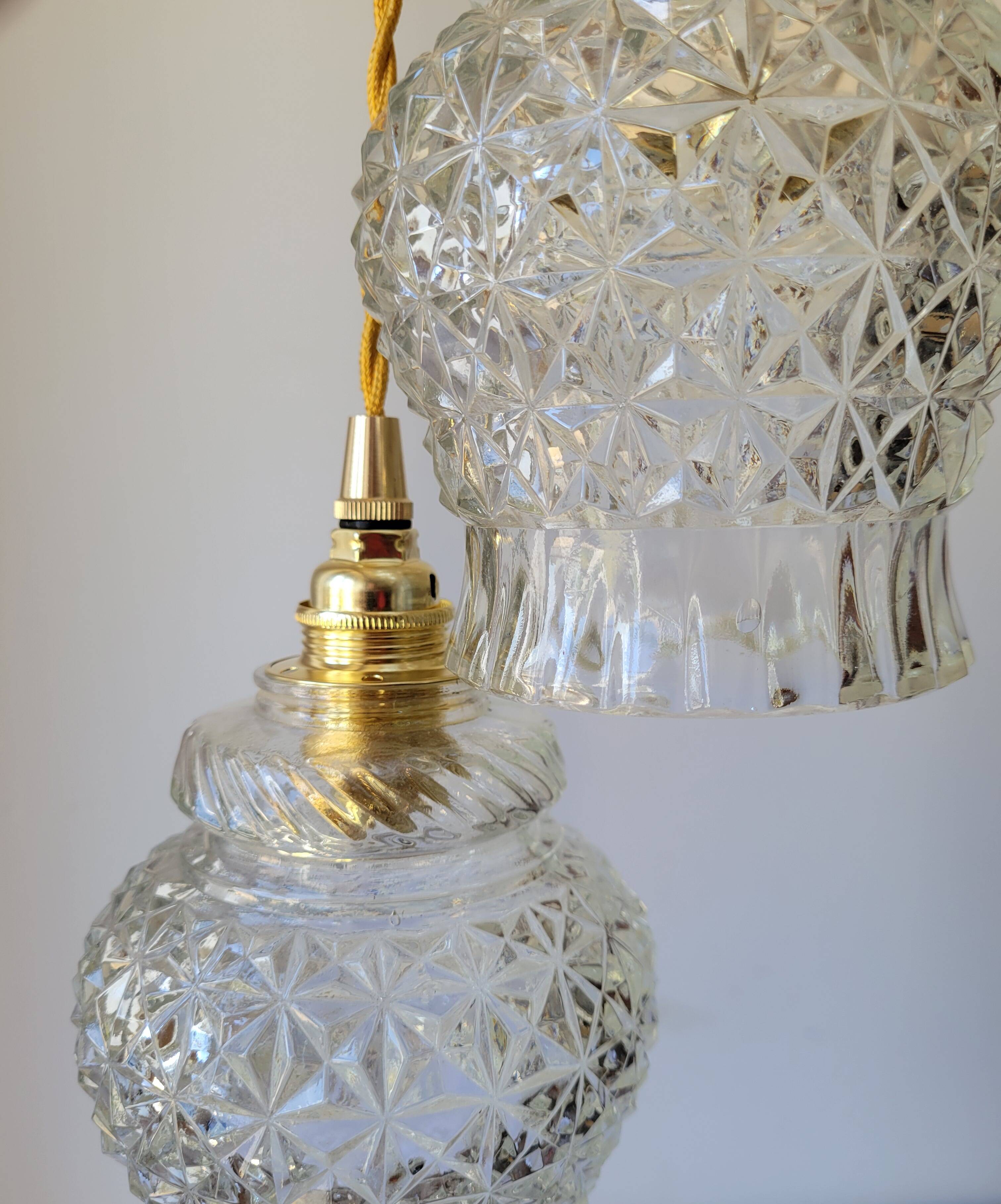 Duo of molded glass pendant lights