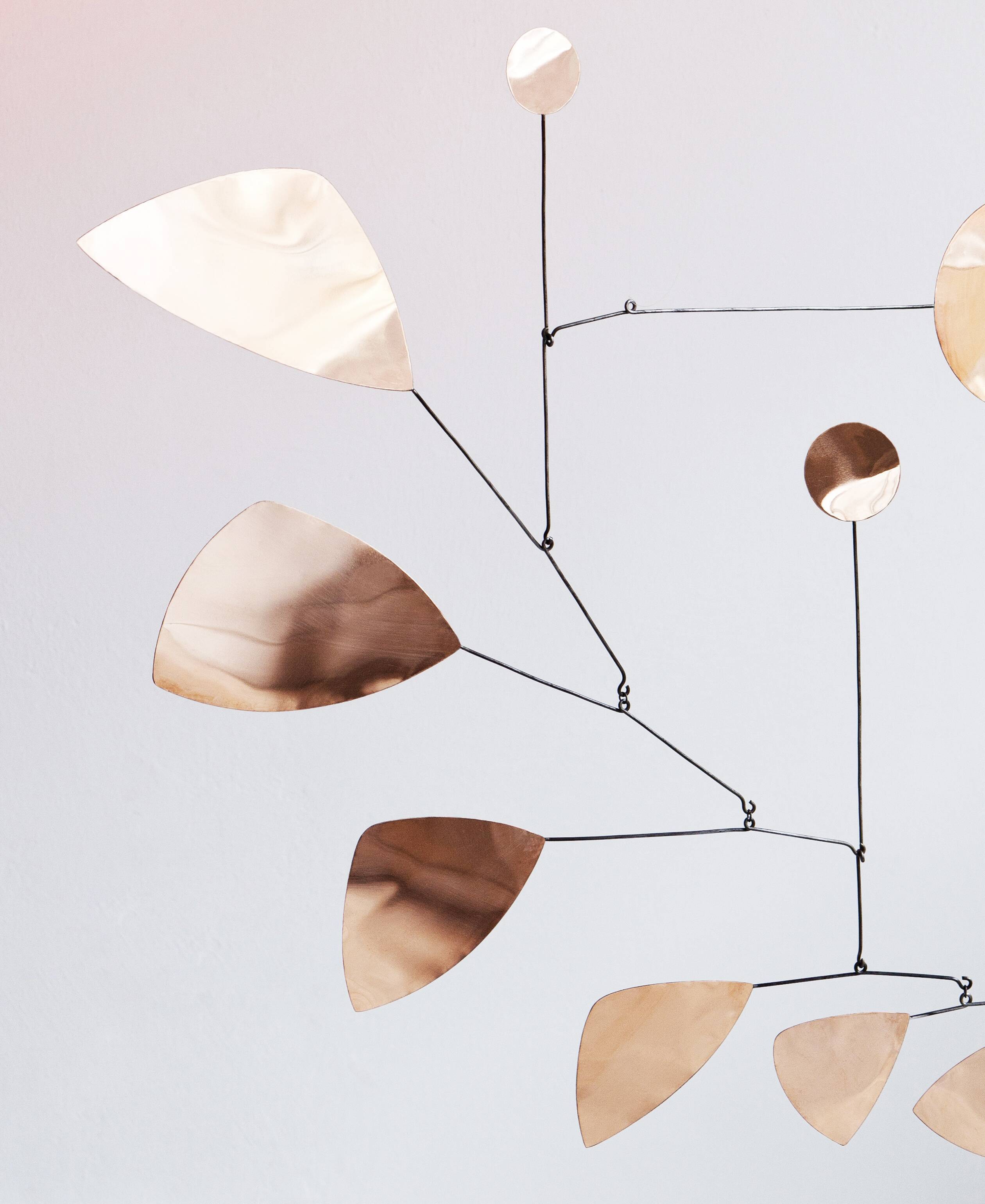 Mobile modernist brass 65 x 70