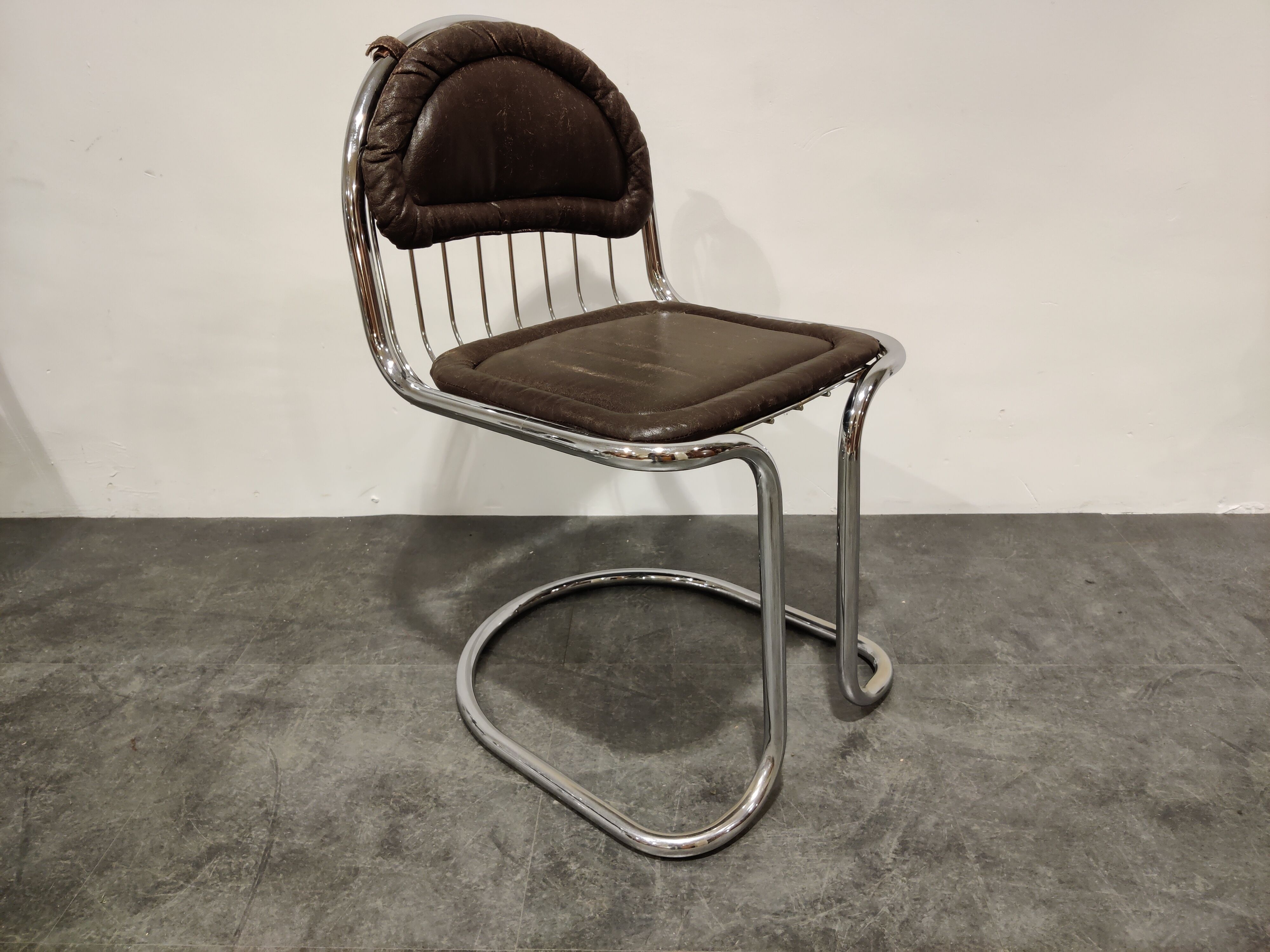 Vintage chrome and leather cantilever dining chairs, 1970s