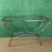 Polished steel and brass console, probably Maison Jansen, France, mid-century modern Hollywood Regency.