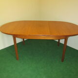 Teak dining table, an extension