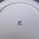 10 blue and green checked ceramic plates