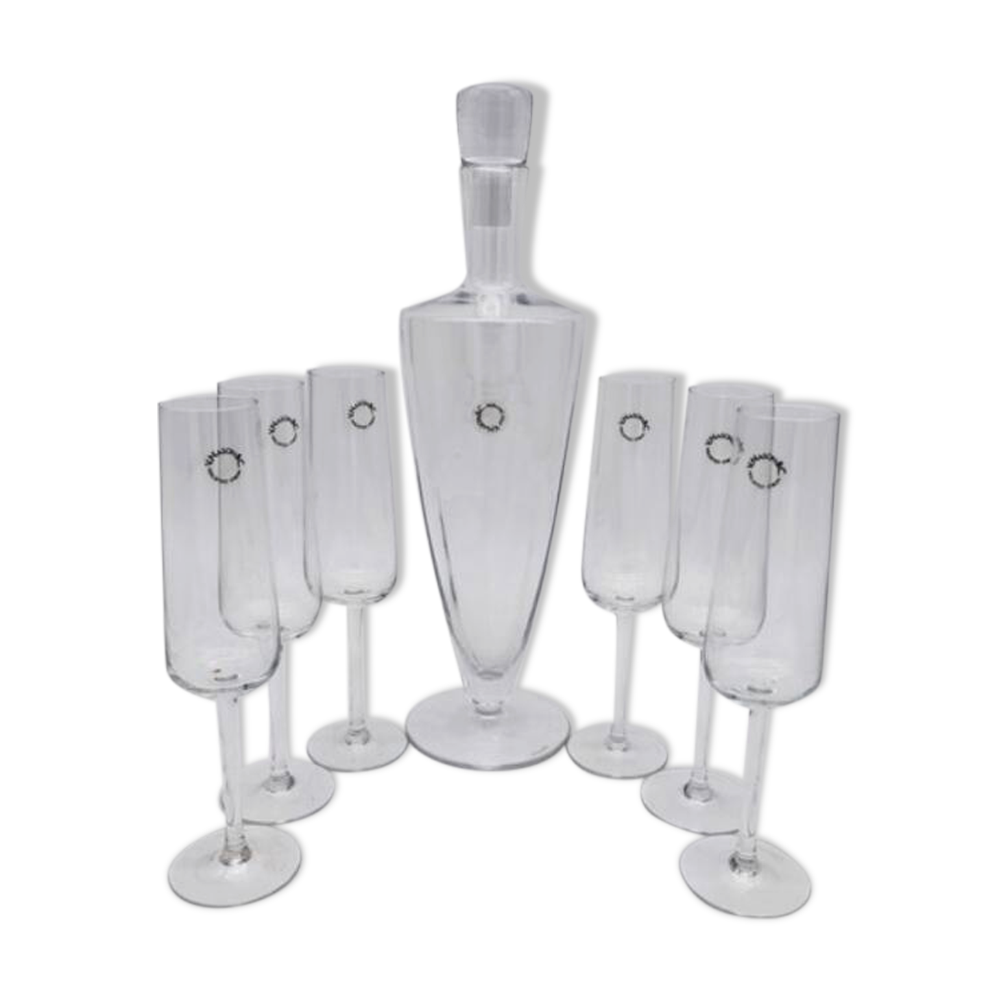 Carafe and 6 stemmed glasses made of Murano glass.