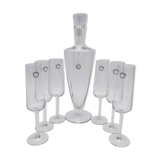 Carafe and 6 stemmed glasses made of Murano glass.
