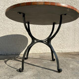 Round garden table in mosaic and iron