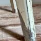 Old workshop stool in patinated solid wood