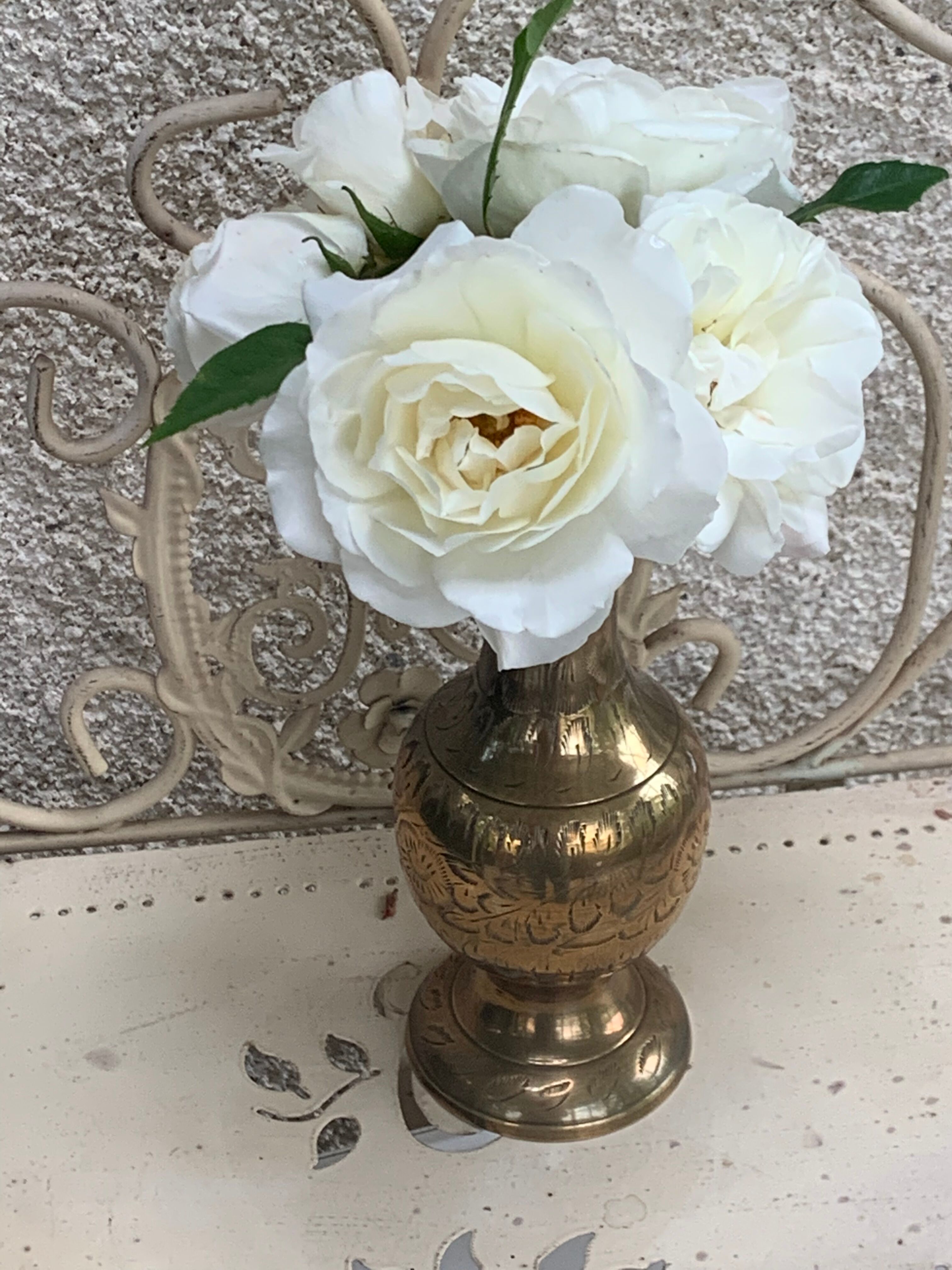 Golden brass vase chiseled vintage floral pattern