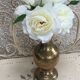 Golden brass vase chiseled vintage floral pattern