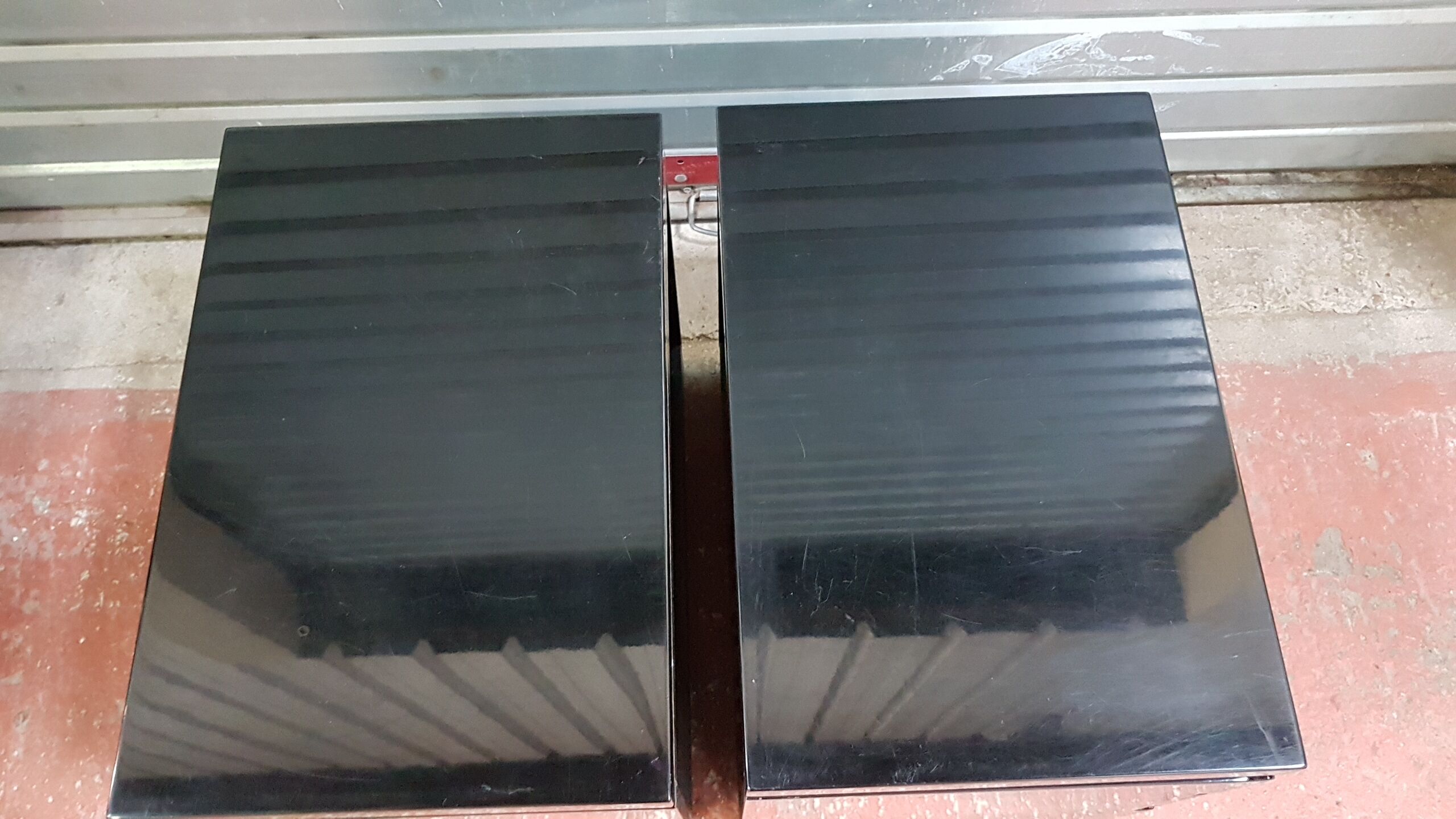 Lacquer black beside tables