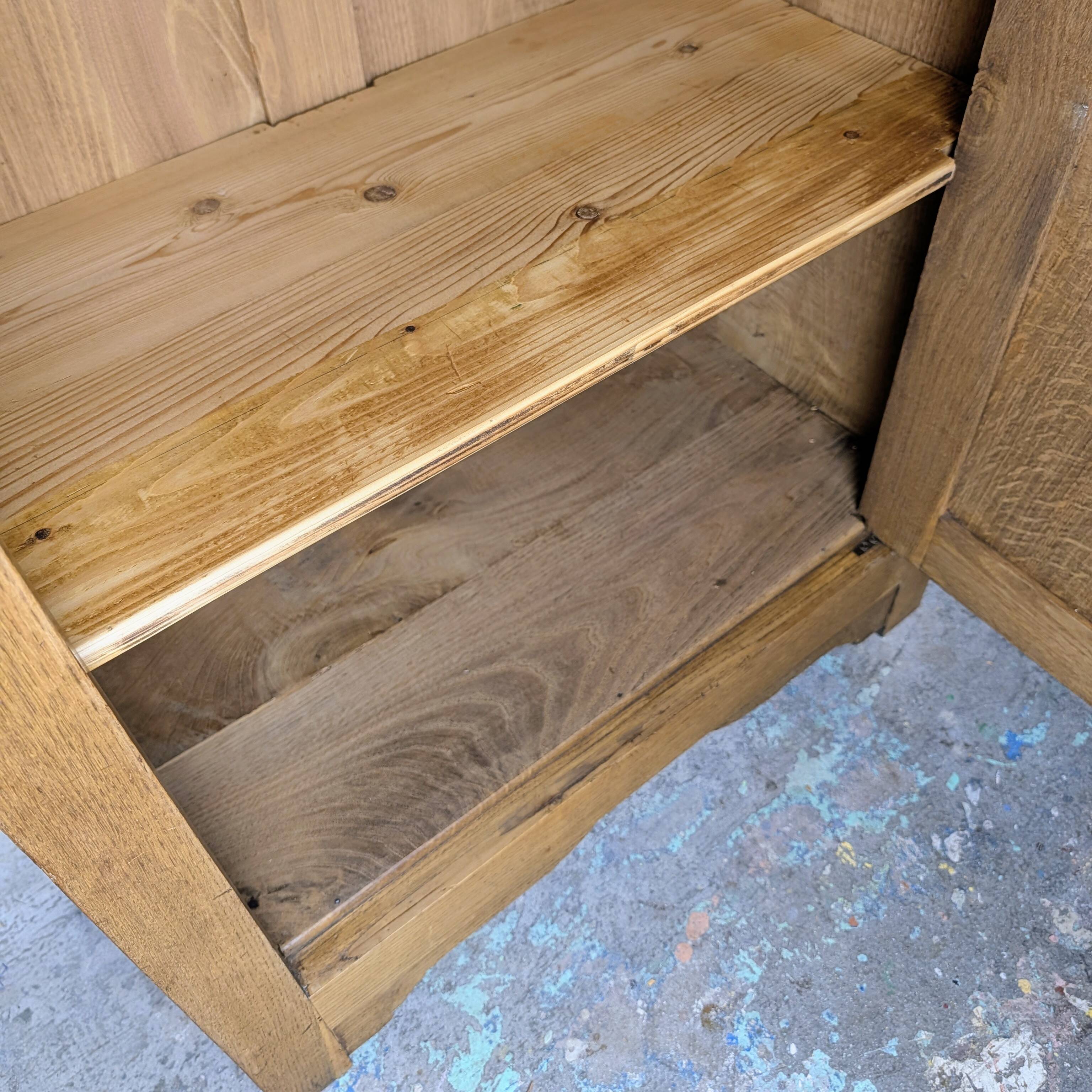 Glass-fronted cabinet from the 1930s-1940s.