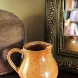 Vintage stoneware pitcher with spout handle
