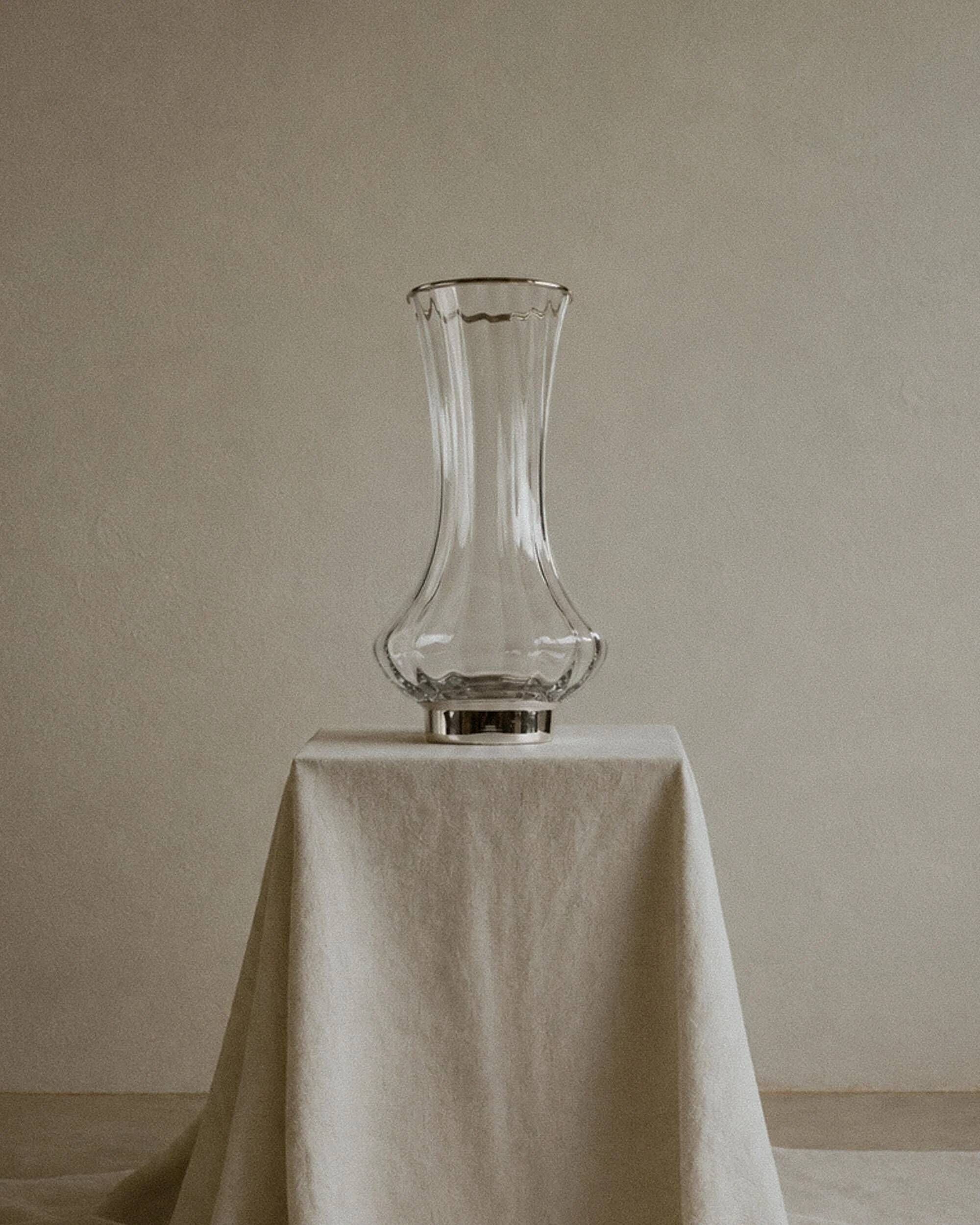 Vintage glass vase from the 1980s, transparent glass with fine linear pattern and silver metal details, elegant sculptural flower vase, gift idea.
