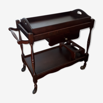 Rolling service with drawer tray and bottle compartments