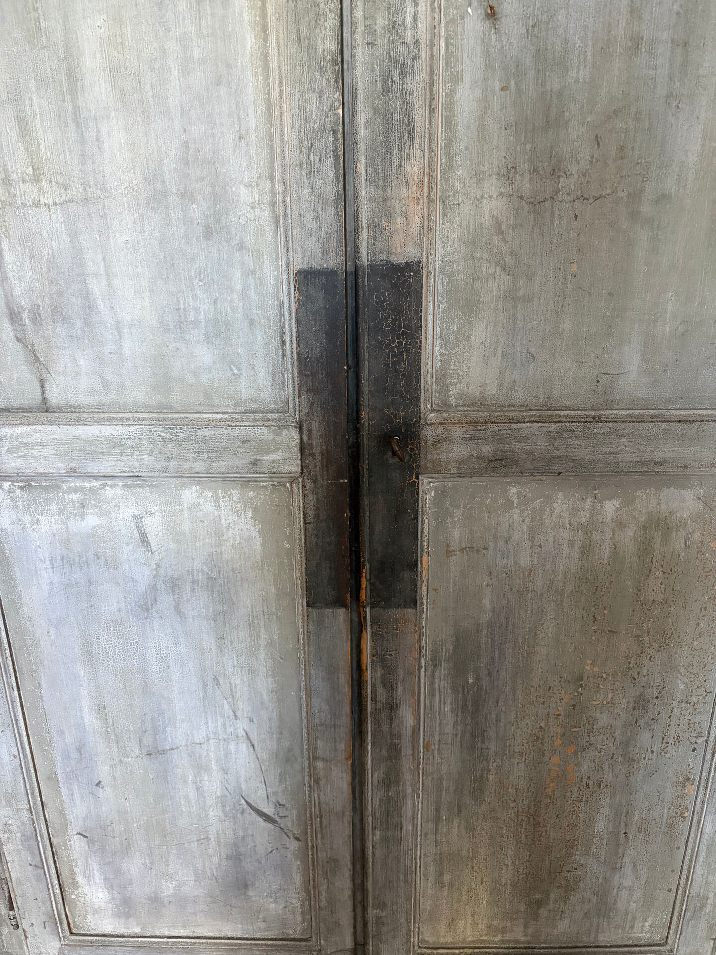 Antique Provençal wardrobe with a patina