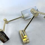 Postmodern pair of articulated brass wall lamps by Baulmann Leuchten. Germany 1980s