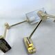 Postmodern pair of articulated brass wall lamps by Baulmann Leuchten. Germany 1980s