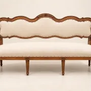 Louis XVI period canapé – Model with eel heads – Carved walnut