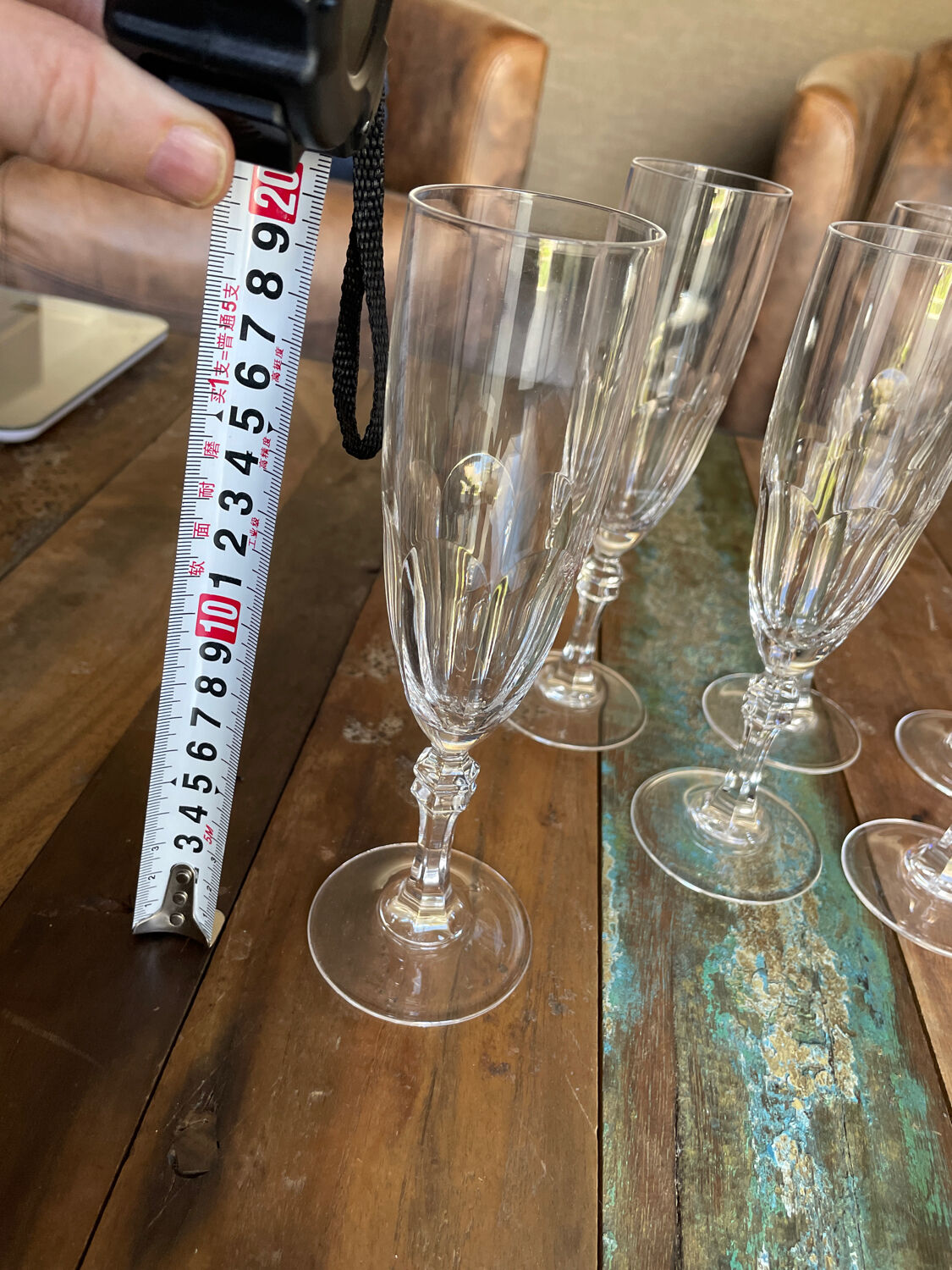 Set of 7 champagne flutes. Made of cut crystal.