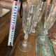 Set of 7 champagne flutes. Made of cut crystal.