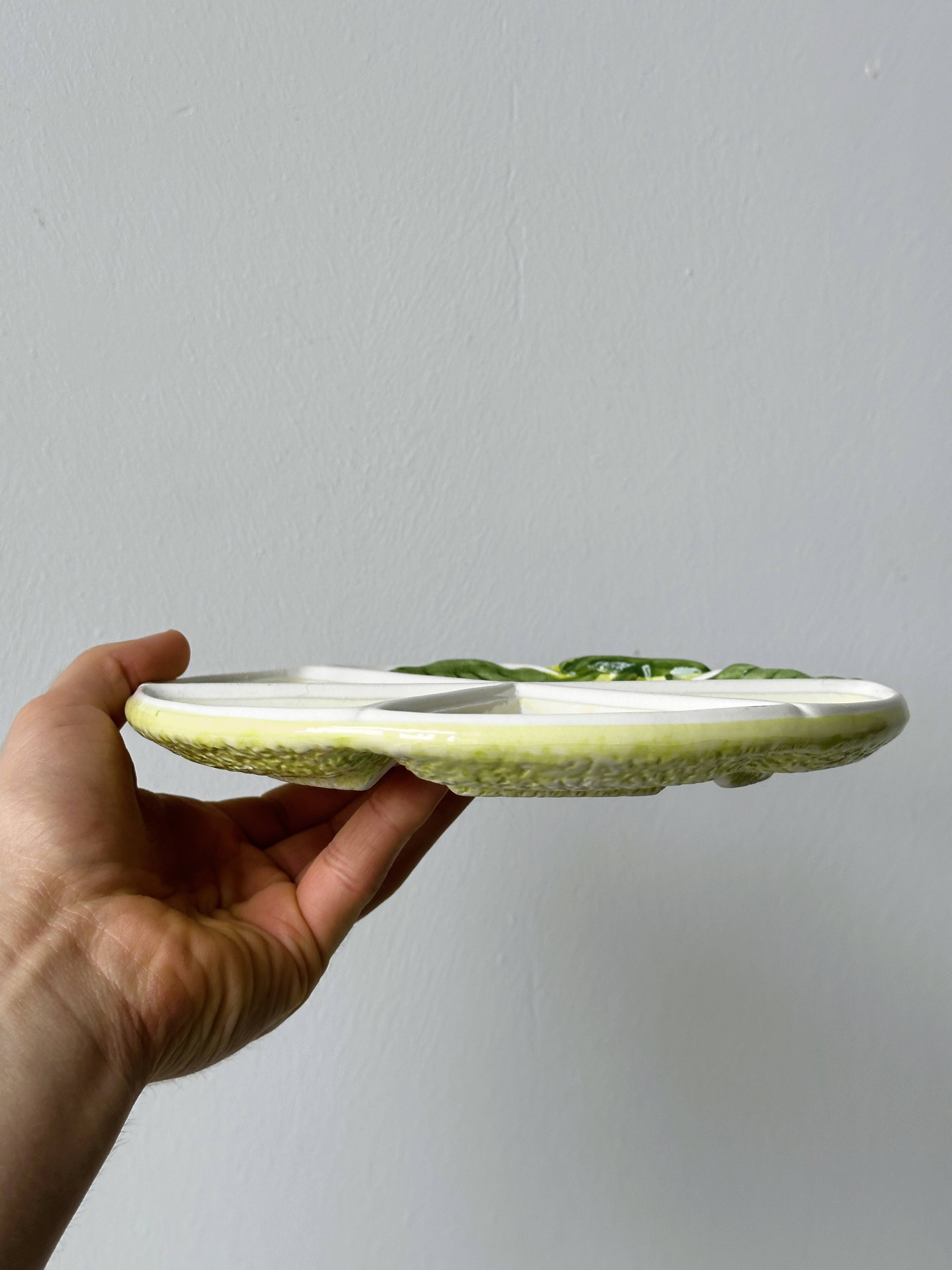 2 ceramic plates depicting a lemon