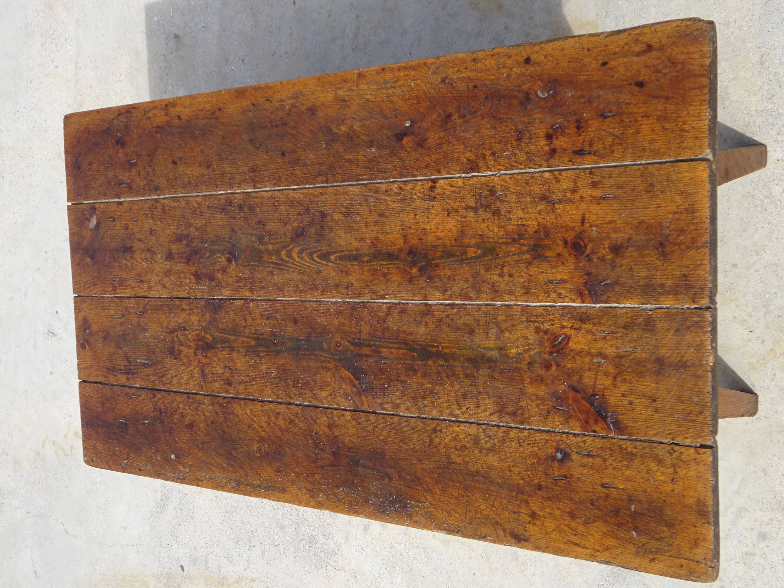 Very old solid oak dough trough with a lid and removable legs.