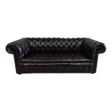 Black leather chesterfield sofa