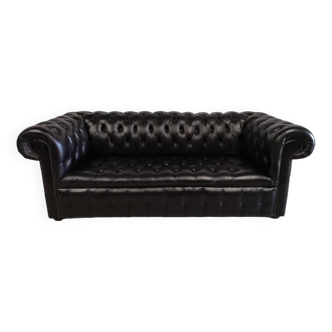 Black leather chesterfield sofa