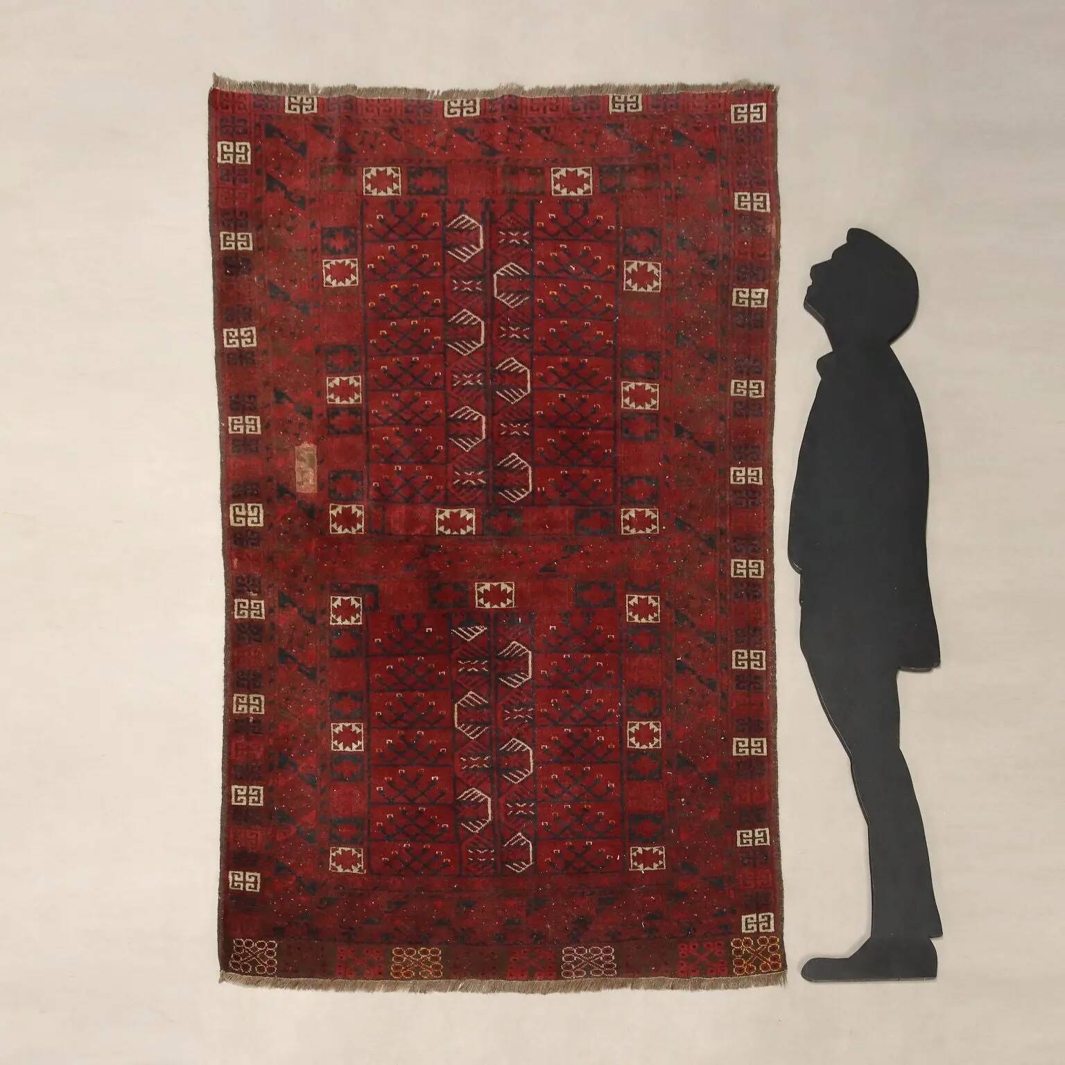Ancient Asian wool rug, hand-knotted, 82 x 51 in.