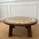 Round coffee table in ceramic and wood in the style of Roger Capron.