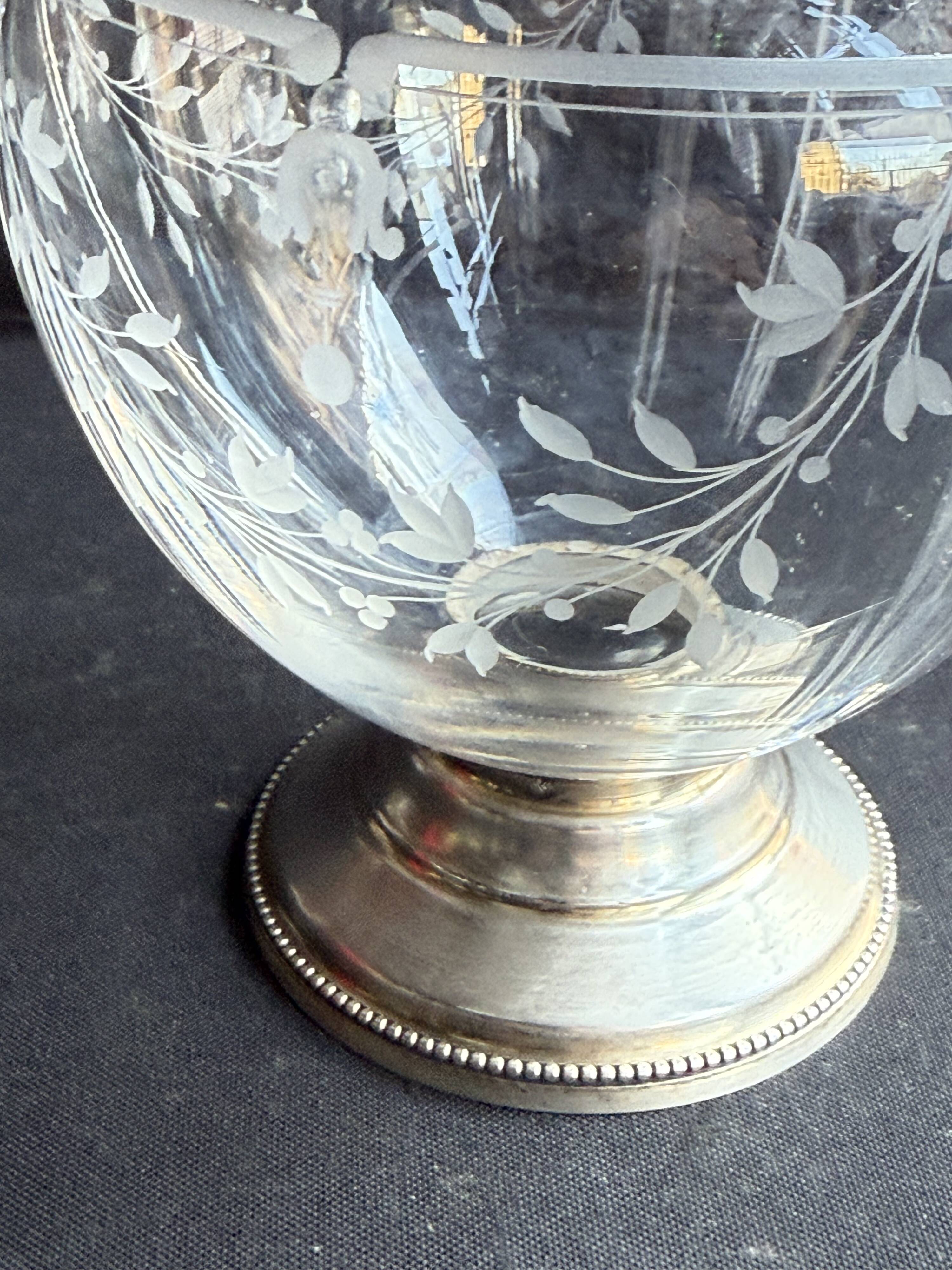 Cut crystal carafe with silver frame