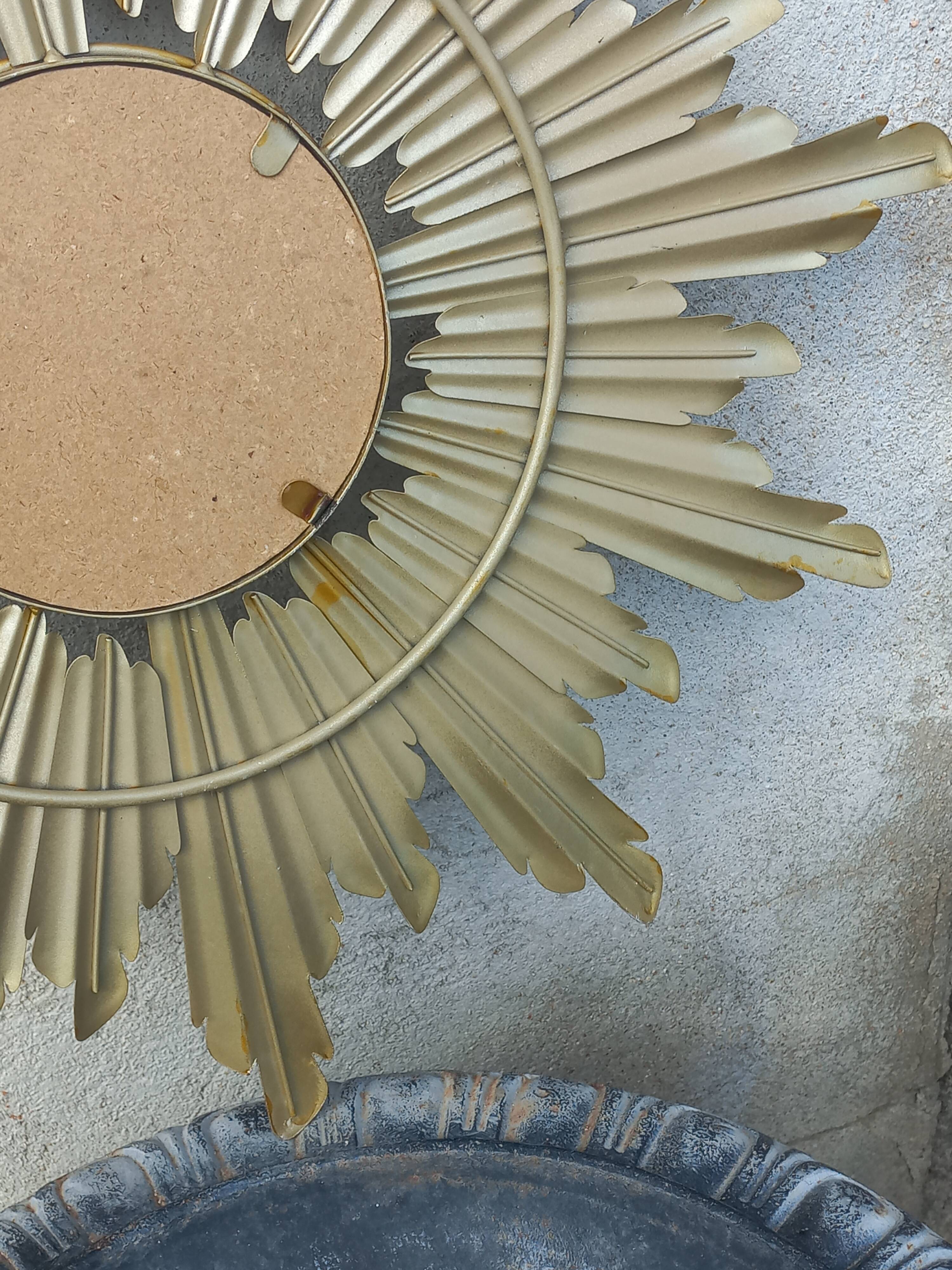 Gold metal sun mirror