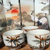 Asian set of a teapot and its cups