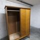 1950 wardrobe with compass legs, sliding doors, and a new top.