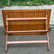 Foldable garden table in solid wood, signed 125x80cm.