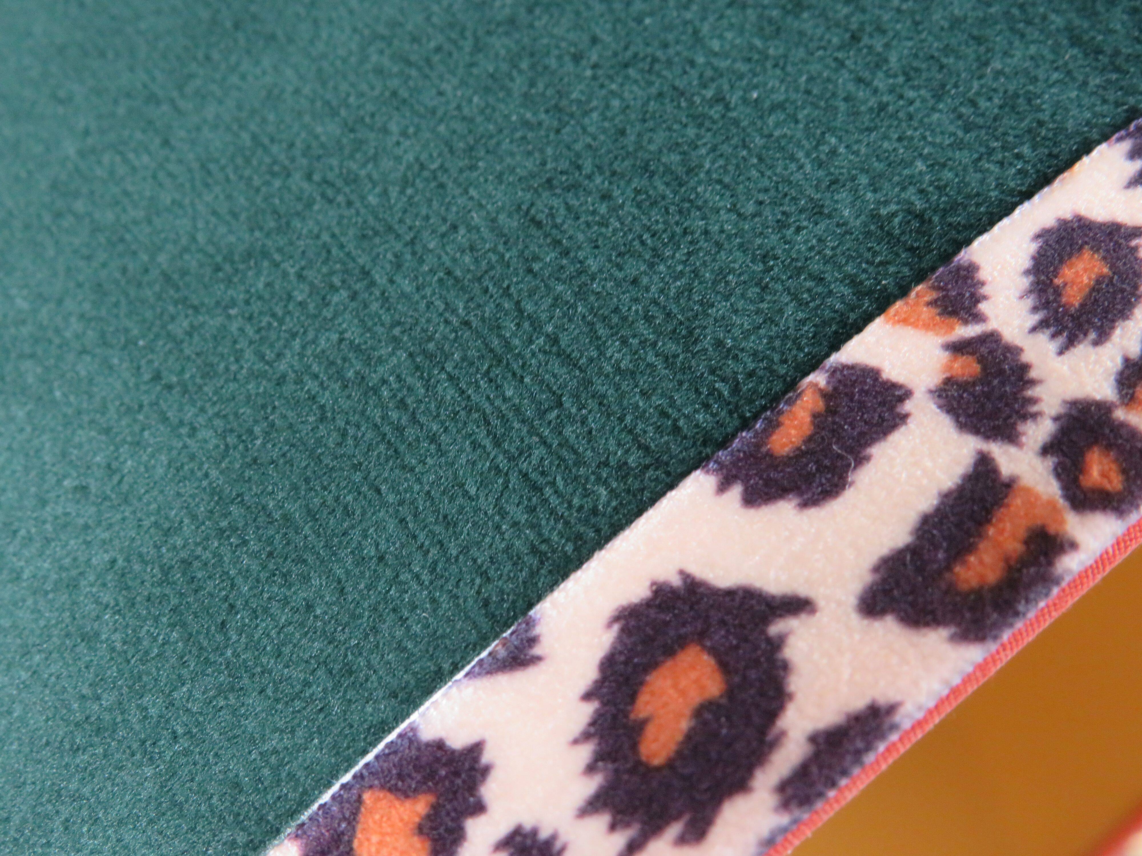 Vintage brass table lamp with green velvet shade.