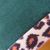 Vintage brass table lamp with green velvet shade.