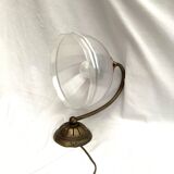 Brass wall light with a glass globe dimension: height -21cm- width -27cm-