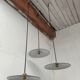 Suspensions in enamelled sheets